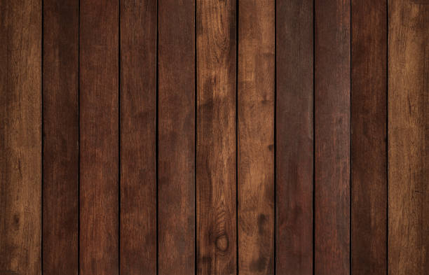 Deep brown stained wood plank texture